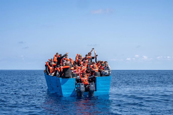 Archivo - March 16, 2024, Libyan Sar Zone, Libya: People on board of a wooden boat in the middle of the Mediterranean Sea. March 16, 2024, MSF vessel Geo Barents intercepted two small boats full of migrants navigating towards Europe in the Libyan SAR zone