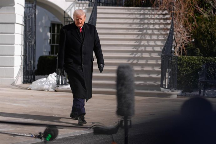 January 27, 2026, Washington, District Of Columbia, USA: United States President Donald J Trump walks on the South Lawn of the White House in Washington, DC, USA, before boarding Marine One on Tuesday, Jan. 27, 2026. Trump is heading back to Americaâ€s he