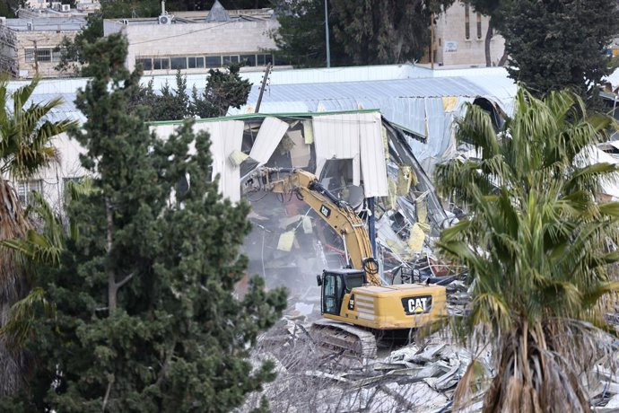 JERUSALEM, Jan. 20, 2026  -- Israeli authorities demolish a building within the East Jerusalem compound of the United Nations Relief and Works Agency for Palestine Refugees (UNRWA), Jan. 20, 2026. Israeli authorities on Tuesday demolished several building