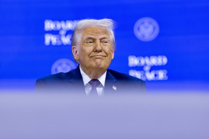 HANDOUT - 22 January 2026, Switzerland, Davos: US President Donald Trump attends the "Board of Peace" initative at the World Economic Forum Annual Meeting in Davos.