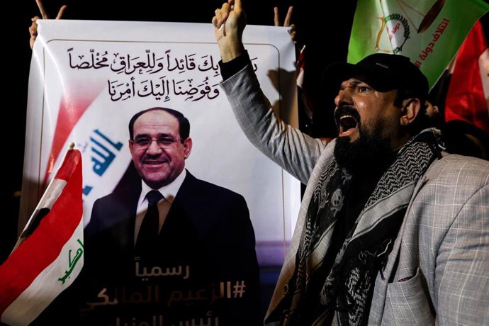 Cartel con la imagen de Nuri al Maliki