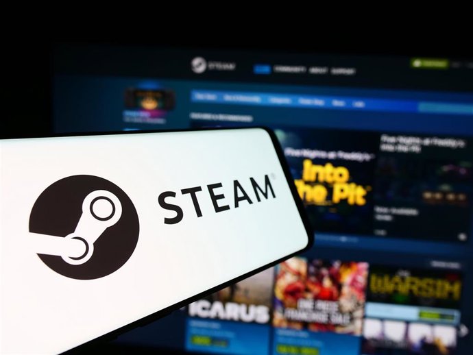 Archivo - August 8, 2024, Germany: In this photo illustration, a cellphone with the logo of American video game distribution company Steam (Valve) is seen in front of website.