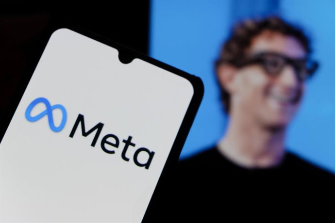 Archivo - September 25, 2025, Bandung, West Java, Indonesia: In this photo illustration, Meta logo is displayed on a smartphone with MARK ZUCKERBERG photo facebook profile account in the background.