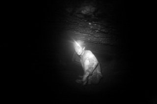 Archivo - Jan 5, 2011 - , India - A teenage miner burrows through a tunnel 300 feet below the surface of the earth in the Jaintia Hills, Meghalaya, North East India, 2011. Miners lower to great depths in the ground often on slippery and shaky wooden ladde