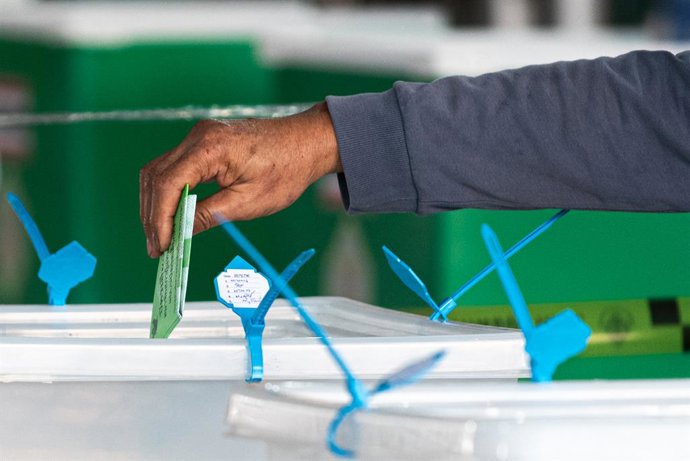 February 8, 2026, Bangkok, Thailand: A man casts his ballot at a polling station during Thailand's general election in Bangkok.