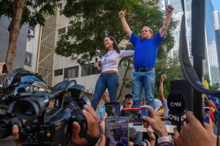 Archivo - January 9, 2025, Caracas, Miranda, Venezuela: Opposition leader Maria Corina Machado and politician Juan Pablo Guanipa, appear at the opposition rally called by her, in the streets of Caracas...Government and opposition marches and rallies prior