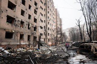 February 8, 2026, Kramatorsk, Donetsk Oblast, Ukraine: A worker at the scene walks past the site of a Russian aerial attack carried out the previous night, which killed one person and injured at least four others.