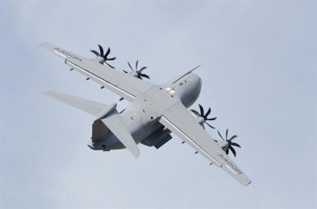 July 12, 2014: The Airbus A400M Atlas Four-Engined Military Transport Aircraft Pulling A Tight Turn During A Display At The Royal International Air Tattoo. The Royal Airforce Is Due To Take Delivery Of It's First Aircraft In September 2014.