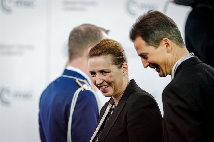 13 February 2026, Bavaria, Munich: Mette Frederiksen, Denmark's Prime Minister, and Jens Frederik Nielsen (R), Greenland's Prime Minister, attend the opening of the 62nd Munich Security Conference, which will host over 60 heads of state and government-the