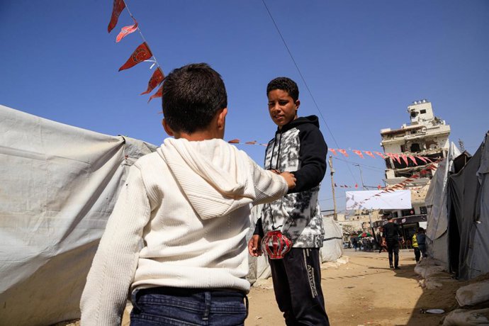 February 15, 2026, Gaza, Palestine: (INT) Palestinian Boy Crafts Ramadan Lanterns Amid Hardships in Gaza.  February 15, 2026, Gaza, Palestine: Fourteen-year-old Palestinian boy Ahmed Abu Ouda creates simple Ramadan lanterns from empty soda cans in an effo
