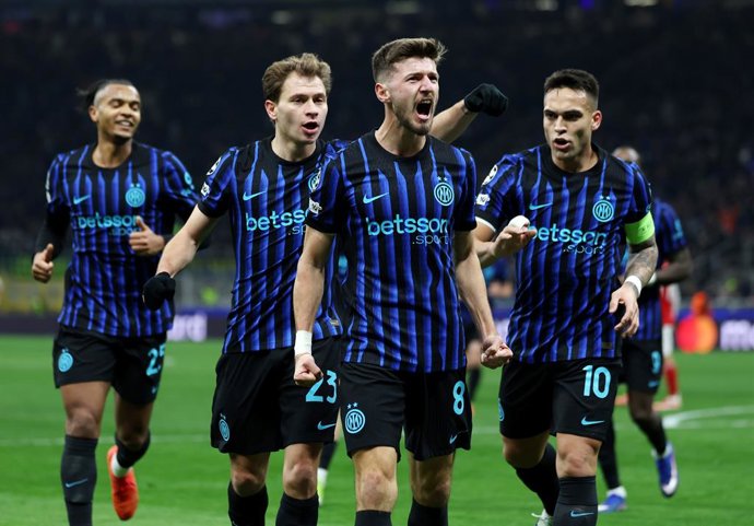 20 January 2026, Italy, Milan: Inter Milan's Petar Sucic (2nd R) celebrates scoring his side's first goal with team-mates during the UEFA Champions League soccer match between Inter Milan and Arsenal at the San Siro. Photo: Fabrizio Carabelli/PA Wire/dpa