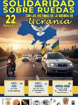 Cartel de la caravana solidaria 'Solidaridad sobre Ruedas' en Almería.