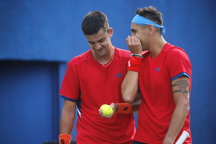 Tenis, Chile vs Peru. Copa Davis 2023. El jugador de Chile Alejandro Tabilo y Tomas Barrios celebran un punto contra Arklon Huertas del Pino y Conner Huertas del Pino de Peru durante el partido de la Copa Davis disputado en el Court Central Anita Lizana