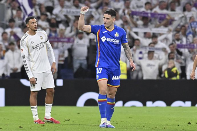 02 March 2026, Spain, Madrid: Getafe's Martin Satriano celebrates scoring his side's first goal during the Spanish Primera Division soccer match between Real Madrid CF and Getafe CF football match between Real Madrid CF and Getafe CF at Santiago Bernabeu 