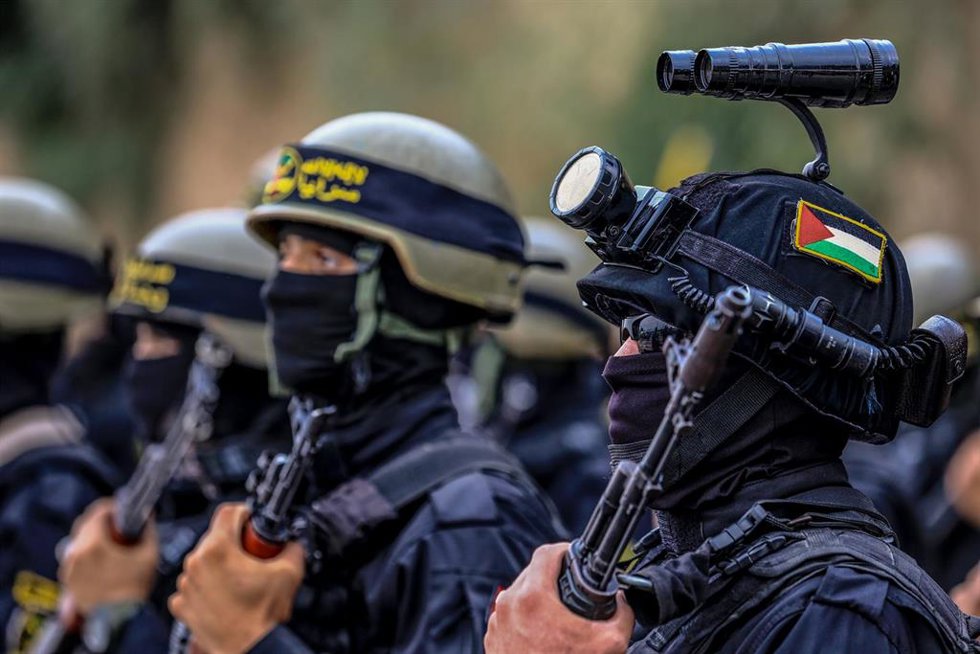 Archivo - Combatientes armados de las Brigadas Al Quds, brazo armado del movimiento Yihad Islámica Palestina (YIP), participan en un desfile para conmemorar el 36. aniversario de la fundación del movimiento en el sur de la Franja de Gaza