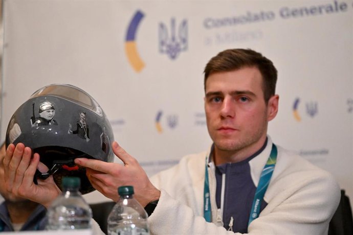 12 February 2026, Italy, Milan: Ukrainian skeleton racer Vladyslav Heraskevych speaks at a press conference at the Ukrainian Consulate in Milan, on the sidelines of the Milano Cortina 2026 Winter Olympic games. Heraskevych was disqualified from the compet