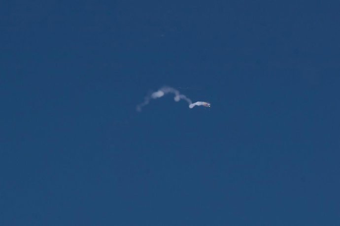 TEL AVIV, March 1, 2026  -- This photo taken on Feb. 28, 2026 shows smoke trails left by interceptor missiles launched from Israeli air defense systems in Tel Aviv, Israel. The United States and Israel on Saturday launched "major combat operations" agains