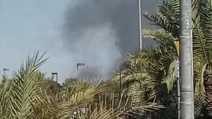 HAWALLI GOVERNORATE, March 2, 2026  -- This screenshot from a video clip taken with a mobile phone shows smoke billowing from an area near the U.S. Embassy in Kuwait's Hawalli Governorate, March 2, 2026.   Smoke was seen billowing from an area near the U.