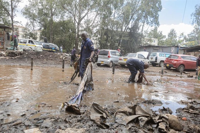 March 9, 2026, Nairobi, Kenya: Mechanics clear flood debris along Grogan Road after flooding disrupted businesses in the area. Heavy rains that pounded Nairobi, Kenya, on Friday, March 6, 2026, triggered flash floods that overwhelmed roads and drainage sy