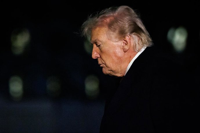 March 15, 2026, Washington, District Of Columbia, USA: United States President Donald J Trump walks on the South Lawn of the White House in Washington, DC, USA, after landing aboard Marine One on March 15, 2026.  The President is returning to the White Ho