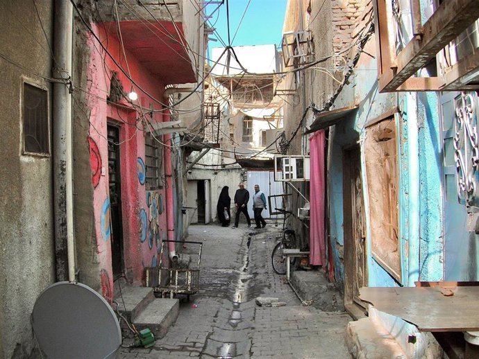 Archivo - Una calle en el barrio de Jadimiya, en la capital de Irak, Bagdad (archivo)