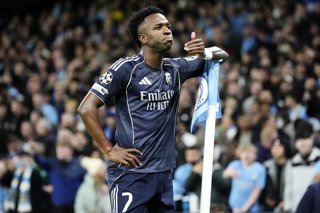 17 March 2026, United Kingdom, Manchester: Real Madrid's Vinicius Junior celebrates scoring his side's first goal during the UEFA Champions League soccer match between Manchester City and Real Madrid at the Etihad Stadium. Photo: Nick Potts/PA Wire/dpa