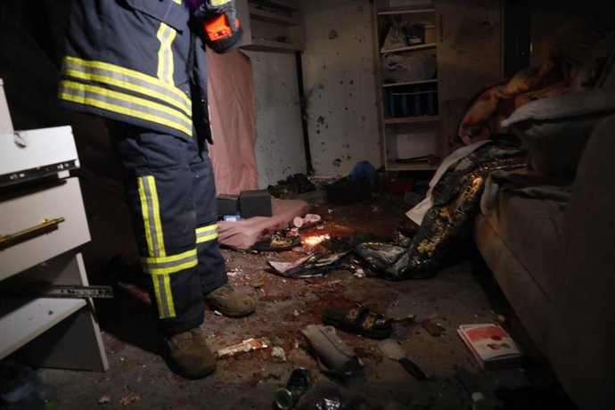 March 18, 2026, Hebron, West Bank, Palestinian Territory: Palestinian civil defense and security forces are investigating the scene of an incident after shrapnel from an Iranian missile struck a women's hair salon in Beit Awa, south of Hebron, in the West