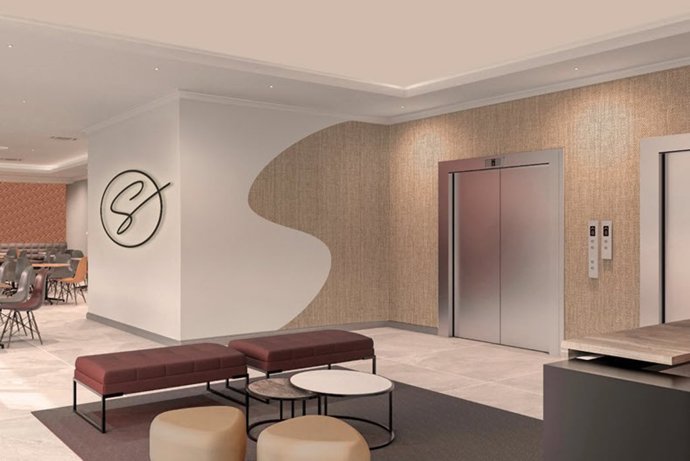 Representación de la recepción de un hotel perteneciente a la serie Splendid by Marriott en el Reino Unido.