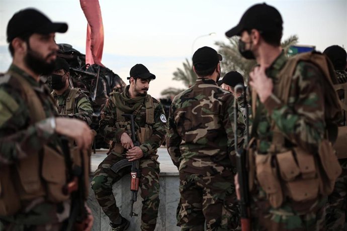 Archivo - Miembros de las milicias iraquíes proiraníes Fuerzas de Movilización Popular (FMP), integrada en las fuerzas de seguridad y formada principalmente por grupos chiíes 