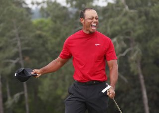 Archivo - 14 April 2019, US, Augusta: US golfer Tiger Woods celebrates after winning the 2019 Masters Golf Tournament at Augusta National Golf Club.At 43 and two years after spinal fusion surgery, Woods captured his fifth Masters title and his 15th major 
