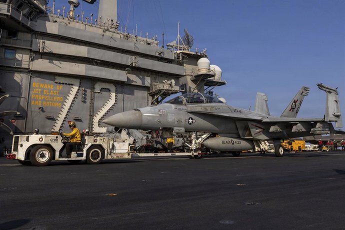 March 8, 2026, Undisclosed Location, United States: A U.S. Navy F/A-18F Super Hornet, with the Black Aces of Strike Fighter Squadron 41, is towed on the flight deck of the Nimitz-class aircraft carrier USS Abraham Lincoln during Operation Epic Fury, March
