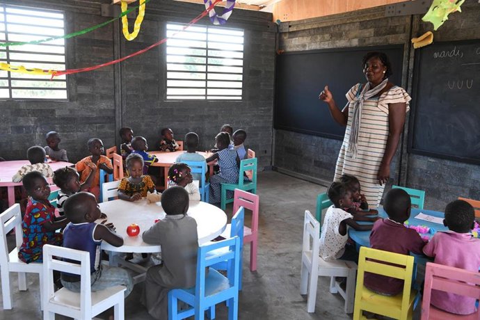 Preschool children in their new classes in a school made out of recycled plastic bricks, in Touba, in the West of Côte d'ivoire.