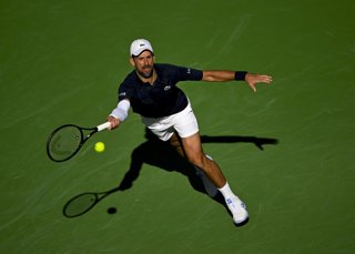 07 March 2026, US, Indian Wells: Serbian tennis player Novak Djokovic plays a forehand return to Poland's Kamil Majchrzak during Day 4 of the BNP Paribas Open at the Indian Wells Tennis Garden. Photo: Charles Baus/CSM via ZUMA Press Wire/dpa
