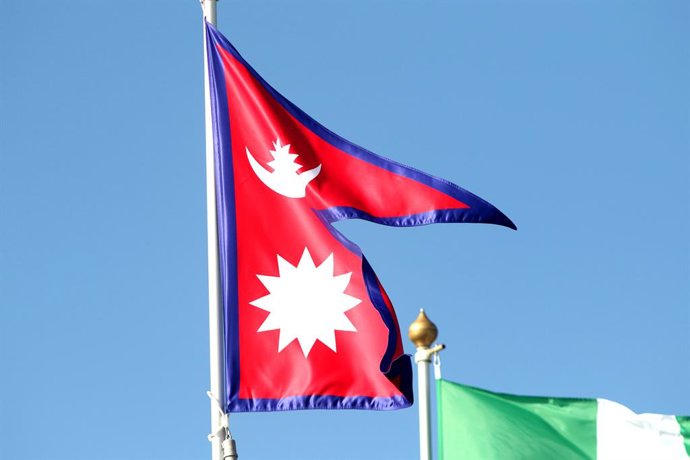 Archivo - June 9, 2024, Saint Petersburg, Russia: The flag of the Federal Democratic Republic of Nepal seen in the gallery of flags of the participating countries in the framework of St. Petersburg International Economic Forum 2024