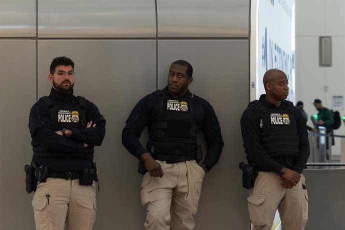 March 24, 2026, Elmhurst, United States: ICE agents are seen stationed at LaGuardia Airport. A partial government shutdown has resulted in callouts by unpaid TSA agents. President Trump called in ICE to assist with operations at 13 airports across the cou