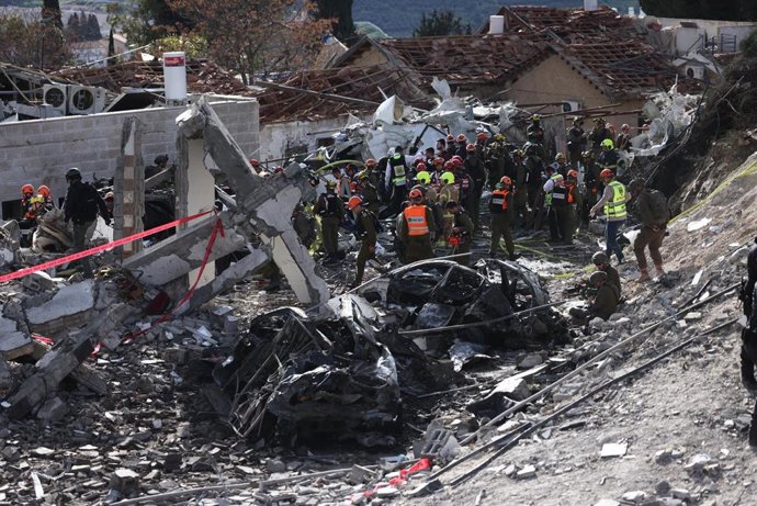JERUSALEM, March 1, 2026  -- This photo taken on March 1, 2026 shows the scene of a missile strike in Beit Shemesh, west of Jerusalem. Six people were killed and at least 23 were injured on Sunday when an Iranian missile struck a residential area in Beit 