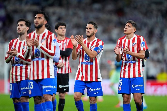 Nahuel Molina and Jorge Resurreccion Koke of Atletico de Madrid greet the supporters during the Spanish League, LaLiga EA Sports, football match played between Real Madrid and Atletico de Madrid at Bernabeu stadium on March 22, 2026, in Madrid, Spain.