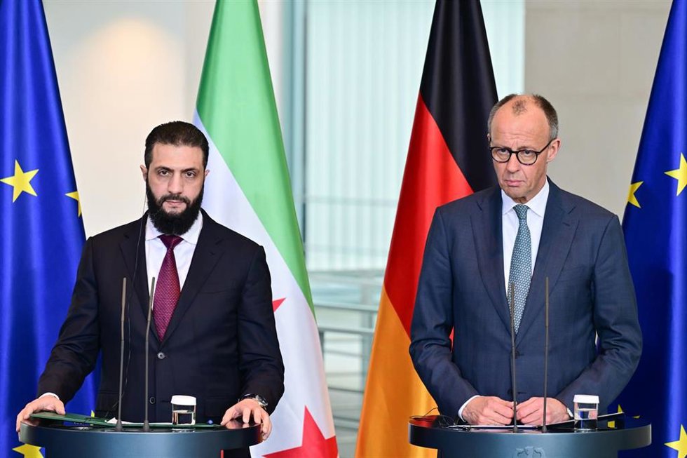 El canciller alemán, Friedrich Merz, y el presidente de transición sirio, Ahmed al Shara