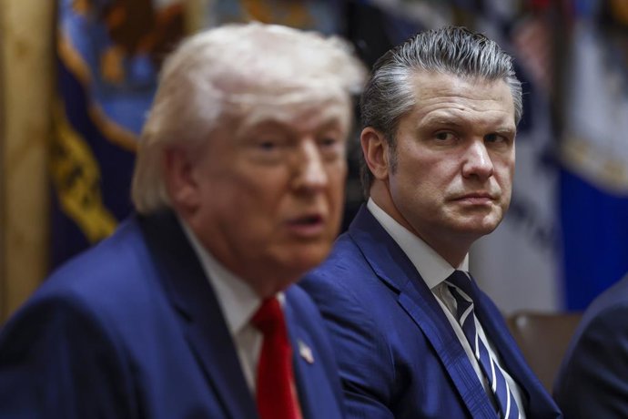 March 26, 2026, Washington, District Of Columbia, USA: United States Secretary of War Pete Hegseth listens as US President Donald J. Trump delivers remarks during a Cabinet meeting in the Cabinet Room of the White House in Washington, DC, USA, 26 March 20