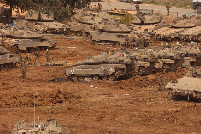 JERUSALEM, March 13, 2026  -- Israeli troops stage at a staging area in northern Israel near the border with Lebanon, March 13, 2026. The Israeli army said Friday in a statement that it has begun a broad reinforcement of troops along the northern border w