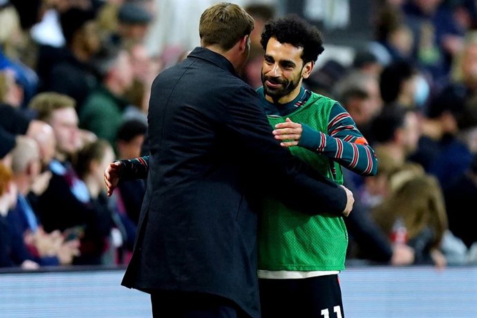 10 May 2022, United Kingdom, Birmingham: Aston Villa manager Steven Gerrard (L) hugs Liverpool's Mohamed Salah during the English Premier League soccer match btewwen Aston Villa and Liverpool at Villa Park.