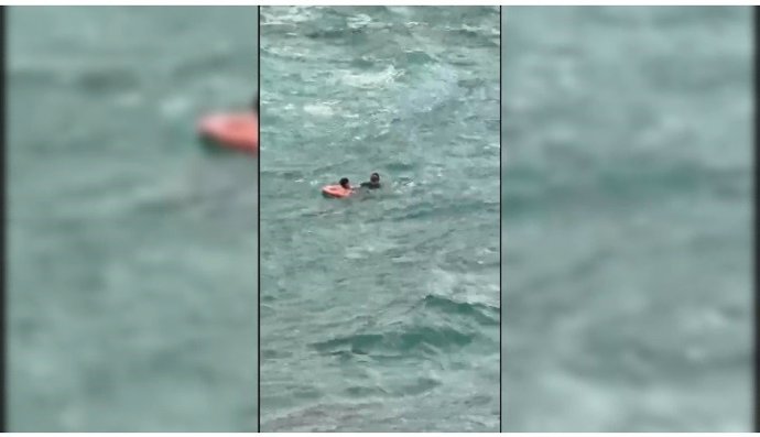 Rescate de un menor atrapado en una zona rocosa de la playa de Trápana en Melilla.
