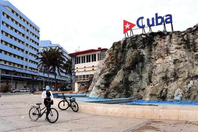 HAVANA, March 17, 2026  -- A woman travels by bicycle in Havana, Cuba, on March 17, 2026. Cuba's national power grid suffered a total blackout on Monday, and the process of restoring electricity is currently underway, according to the Electric Union of Cu