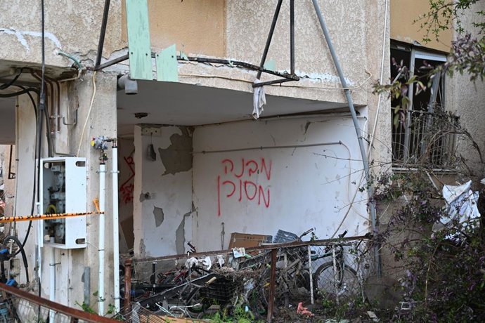 March 22, 2026, Arad, Ramat Gan, Israel: Central Israel - Heavy damage was caused to nine buildings and a mass casualty incident was declared following an Iranian missile strike. The Israeli Air Force is investigating why the missile was not intercepted.,