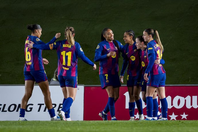 March 29, 2026, Valdebebas, Madrid, Spain: Players of FC Barcelona (from L to R) Sydney Schertenleib, Alexia Putellas, Salma Paralluelo, Esmee Brugts, Clara Serrajordi celebrate a goal during the finetwork Liga F match between Real Madrid Femenino and FC 