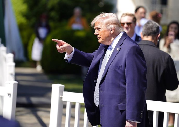 April 6, 2026, Washington, District Of Columbia, USA: United States President Donald J Trump gestures to the press as he and first lady Melania Trump host the 2026 White House Easter Egg Roll, on the South Lawn of the White House in Washington, DC, USA, o