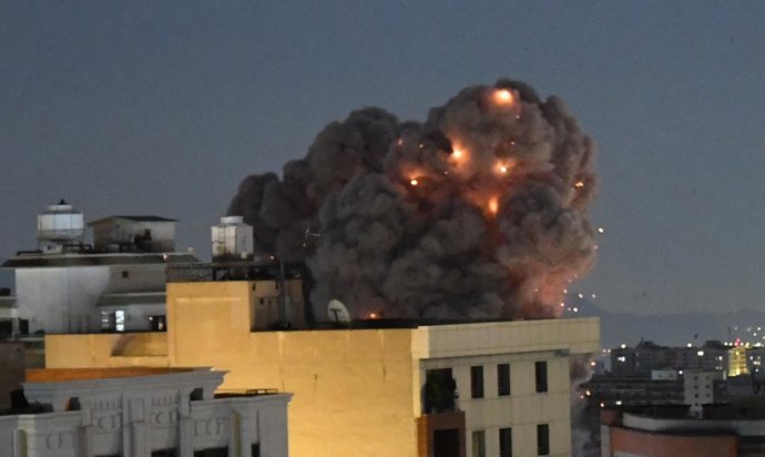 TEHRAN, March 30, 2026  -- Smoke rises from buildings in Tehran, Iran on March 29, 2026. Several areas in the Iranian capital Tehran and the neighboring Alborz province came under U.S. and Israeli attacks on Sunday night, which led to blackouts in a numbe