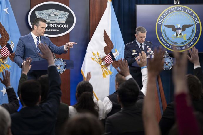 April 8, 2026, Washington, Dc, United States of America: U.S. Secretary of Defense Pete Hegseth, left, calls on a reporter as Chairman of the Joint Chiefs Gen. Dan Caine, right, looks on during a press briefing to discuss the two-week ceasefire agreement 