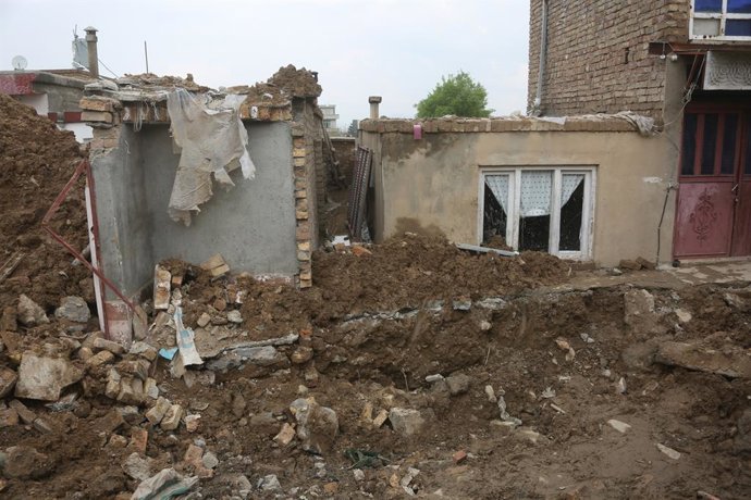 KABUL, April 5, 2026  -- This photo taken on April 5, 2026 shows a building that has collapsed during heavy rains in Kabul, capital of Afghanistan. The death toll from heavy rainfall-triggered flooding across Afghanistan has risen to at least 99 people, w