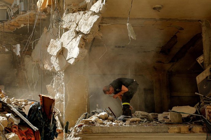 April 10, 2026, Beirut, Beirut, Lebanon: A Lebanese civil defense searches for human body remains inside a building that was targeted in a Israeli air strike on Beirut sea front. Lebanon reeled after the deadliest day of the renewed war between Israel and